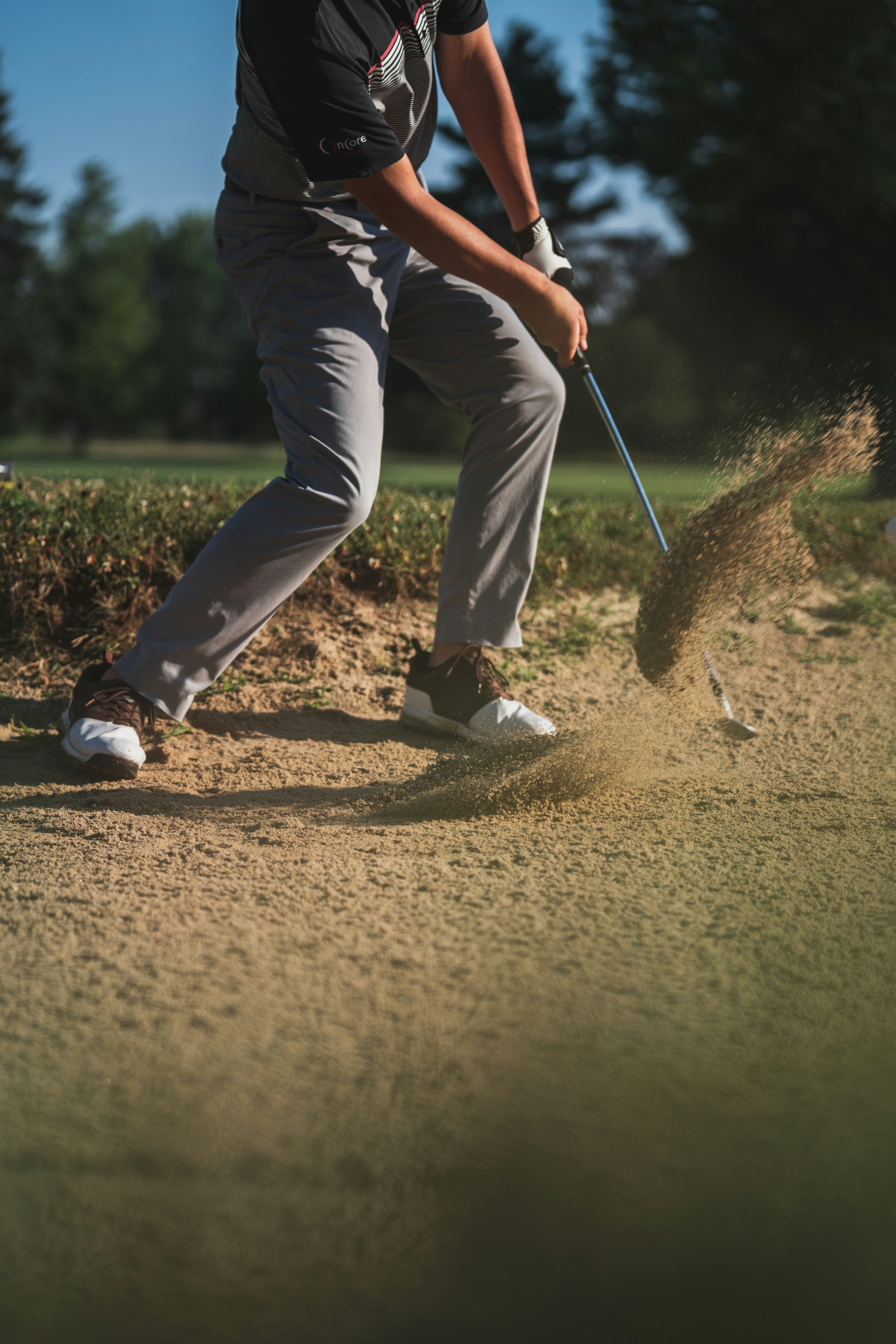 golfer in sandtrap